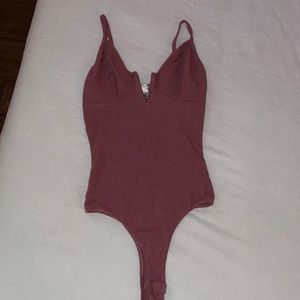 Chic rose colored V-neck one piece